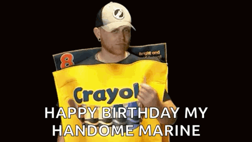 A Man In A Crayola Costume Is Holding A Bag Of Crayola Chips . GIF