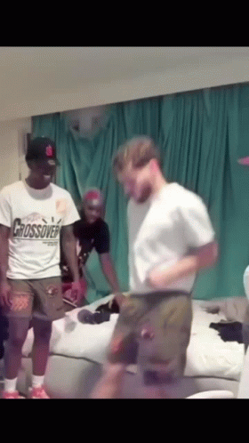 A Man In A Crossover Shirt Is Dancing GIF