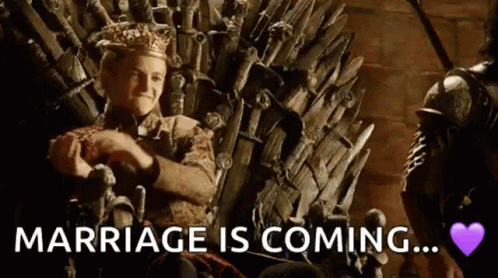 A Man In A Crown Is Sitting On A Throne With The Words `` Marriage Is Coming '' Written On It . GIF