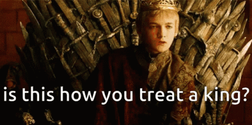 A Man In A Crown Sits On A Throne With The Words " Is This How You Treat A King " GIF