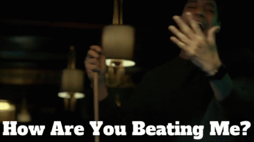 Man In Dark Room With How Are You Beating Me GIF