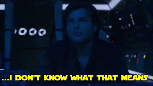 A Man In A Dark Room With The Words " I Don T Know What That Means " GIF