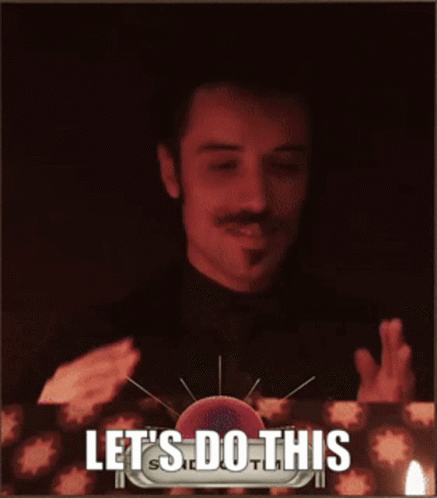 A Man In A Dark Room With The Words Let 'S Do This Behind Him GIF