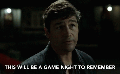 A Man In A Dark Room With The Words This Will Be A Game Night To Remember GIF