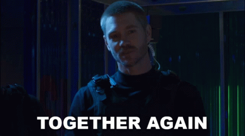 A Man In A Dark Room With The Words Together Again Behind Him GIF