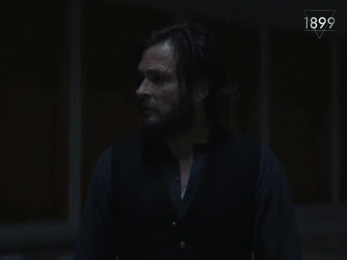 A Man In A Dark Room With The Words " You Mean There 'S A Pattern To It " GIF