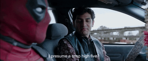 A Man In A Deadpool Costume Is Sitting In A Car GIF