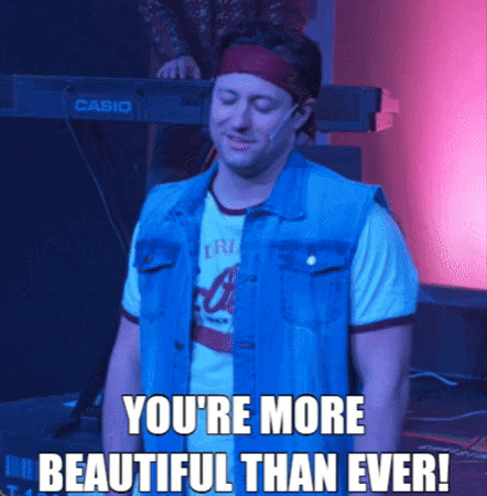 A Man In A Denim Vest Is Standing In Front Of A Casio Keyboard GIF