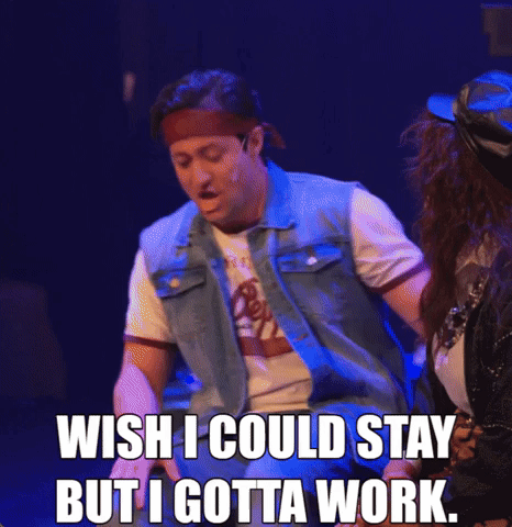 A Man In A Denim Vest Says " Wish I Could Stay But I Gotta Work " On Stage GIF