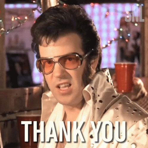 A Man In A Elvis Presley Costume Says " Thank You " GIF
