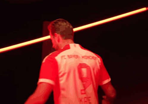 A Man In A Fc Bayern Munchen Jersey GIF