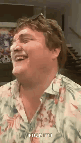 A Man In A Floral Shirt Is Laughing And Saying " Fuck It " . GIF