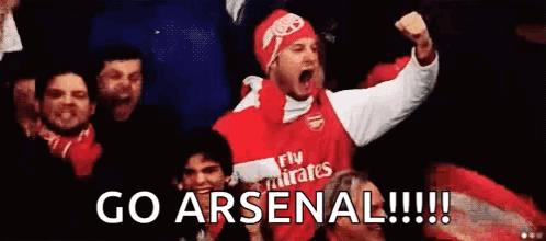 A Man In A Fly Emirates Jersey Is Screaming In The Stands . GIF
