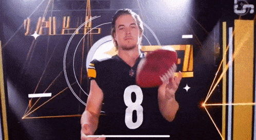 A Man In A Football Jersey With The Number 8 On It GIF