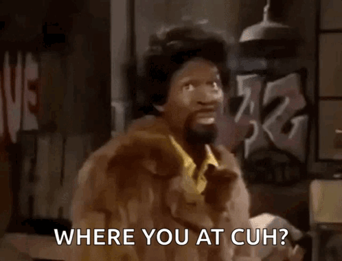 A Man In A Fur Coat Is Asking Where You At Cuh GIF