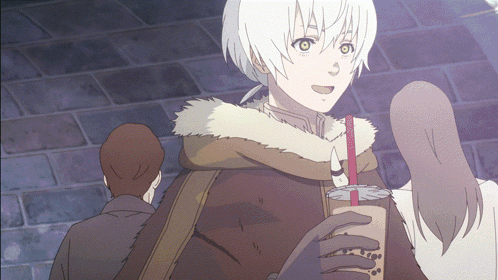 A Man In A Fur Coat Is Holding A Bubble Tea Cup GIF