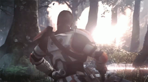 A Man In A Futuristic Armor With The Letter S On His Chest GIF