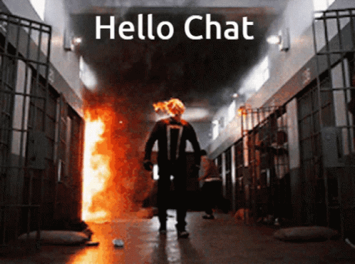 A Man In A Ghost Rider Costume Is Standing In A Hallway With The Words Hello Chat Written Above Him GIF
