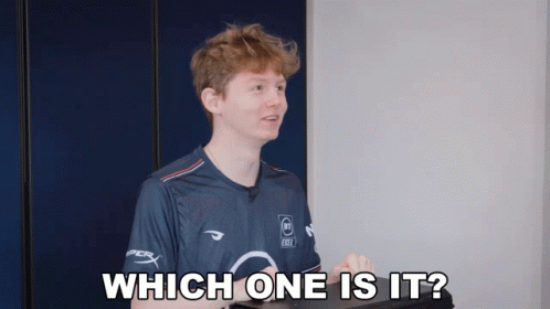 A Man In A Gray Shirt Is Asking Which One Is It GIF