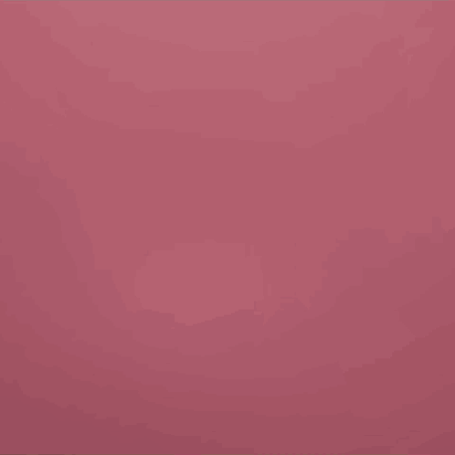 A Man In A Green And White Shirt Is Looking At The Camera GIF