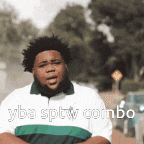 A Man In A Green And White Striped Shirt With The Words Yba Sptw Combo GIF