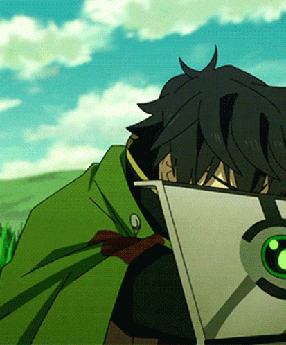 A Man In A Green Cape Is Holding A Shield With A Green Eye On It GIF