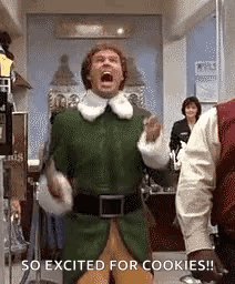 A Man In A Green Elf Costume Is Screaming While Standing In A Room . GIF