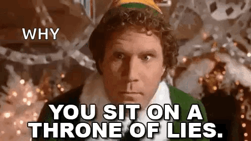 A Man In A Green Elf Costume Is Sitting On A Throne Of Lies In Front Of A Christmas Tree . GIF