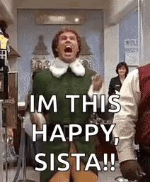A Man In A Green Elf Costume Is Standing In A Room With His Mouth Open . GIF