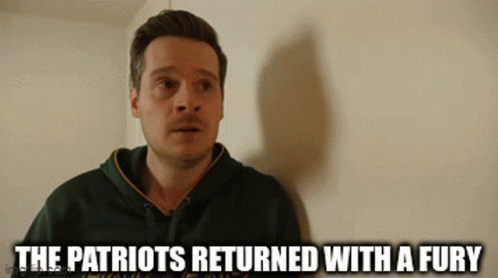 a man in a green hoodie with the words the patriots returned with a fury
