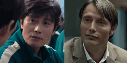 A Man In A Green Jacket Is Next To A Man In A Suit GIF