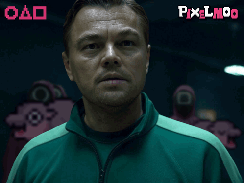A Man In A Green Jacket Is Standing In Front Of A Pixel Moo Logo GIF