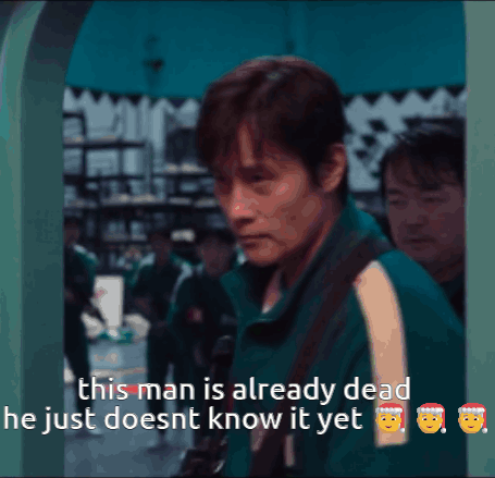 A Man In A Green Jacket Is Talking About A Man Who Is Already Dead GIF