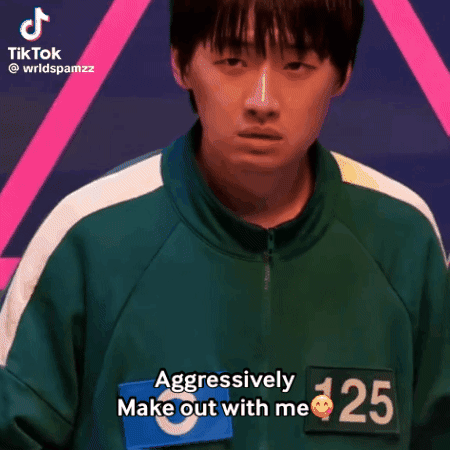 A Man In A Green Jacket With The Number 125 On It GIF