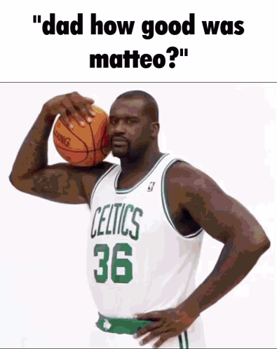 A Man In A Green Kick Jersey Sits In A Chair On A Basketball Court GIF