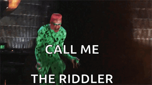 A Man In A Green Riddler Costume Is Screaming And Says Call Me The Riddler GIF