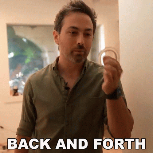 A Man In A Green Shirt Holds Something In His Hand With The Words Back And Forth Behind Him GIF