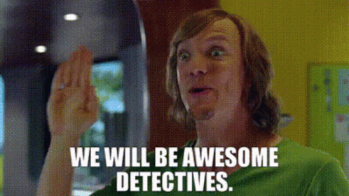 A Man In A Green Shirt Is Making A Funny Face And Saying `` We Will Be Awesome Detectives '' . GIF