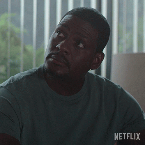 A Man In A Green Shirt Says Please In A Netflix Advertisement GIF