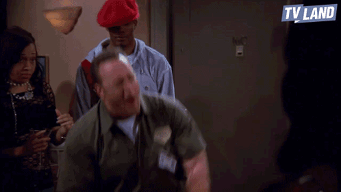 A Man In A Green Shirt Says Up In Here In Front Of A Tv Land Logo GIF