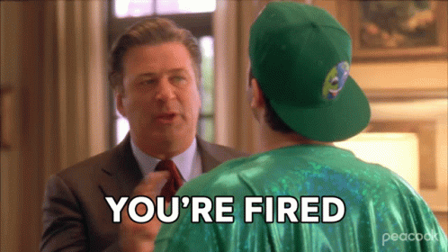 A Man In A Green Shirt Says " You 'Re Fired " To Another Man GIF