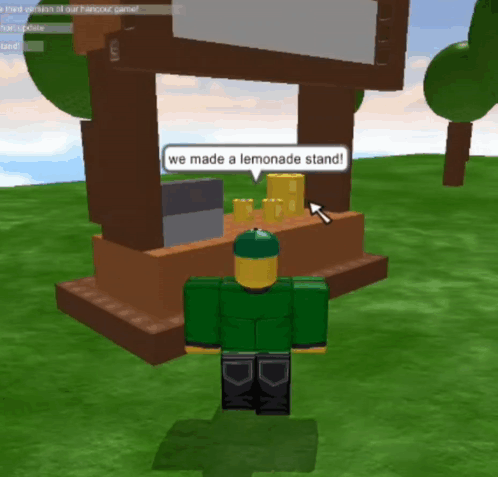 Man In Green Shirt In Front Of Lemonade Stand GIF