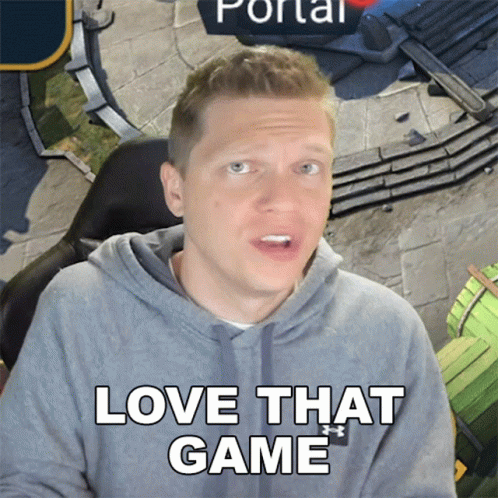 A Man In A Grey Hoodie Says " Love That Game " In White Letters GIF