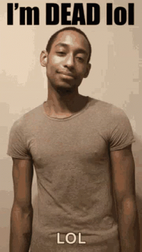 A Man In A Grey T-Shirt Says I 'M Dead Lol GIF