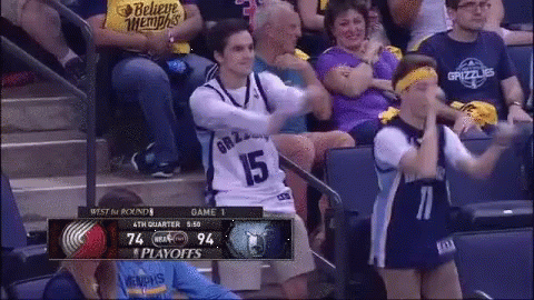 A Man In A Grizzlies Jersey Stands In The Stands GIF