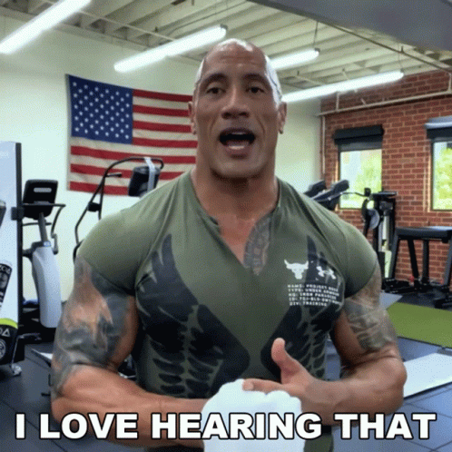 a man in a gym with the words i love hearing that above him