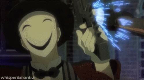 A Man In A Hat And Bow Tie Is Holding A Gun With A Smile On His Face GIF