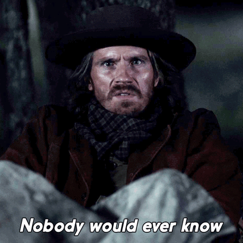 A Man In A Hat And Scarf Is Laying Down With The Words Nobody Would Ever Know Below Him GIF