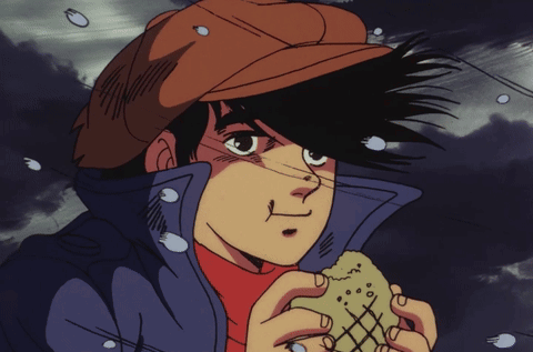 Man In Hat Holding Bread GIF