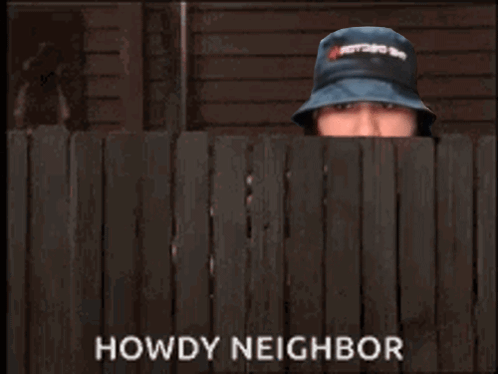 A Man In A Hat Is Peeking Over A Wooden Fence And The Words Howdy Neighbor Are Above Him GIF